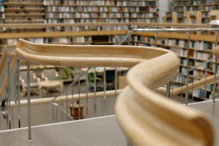 Modern library interior with computers and technology workstations