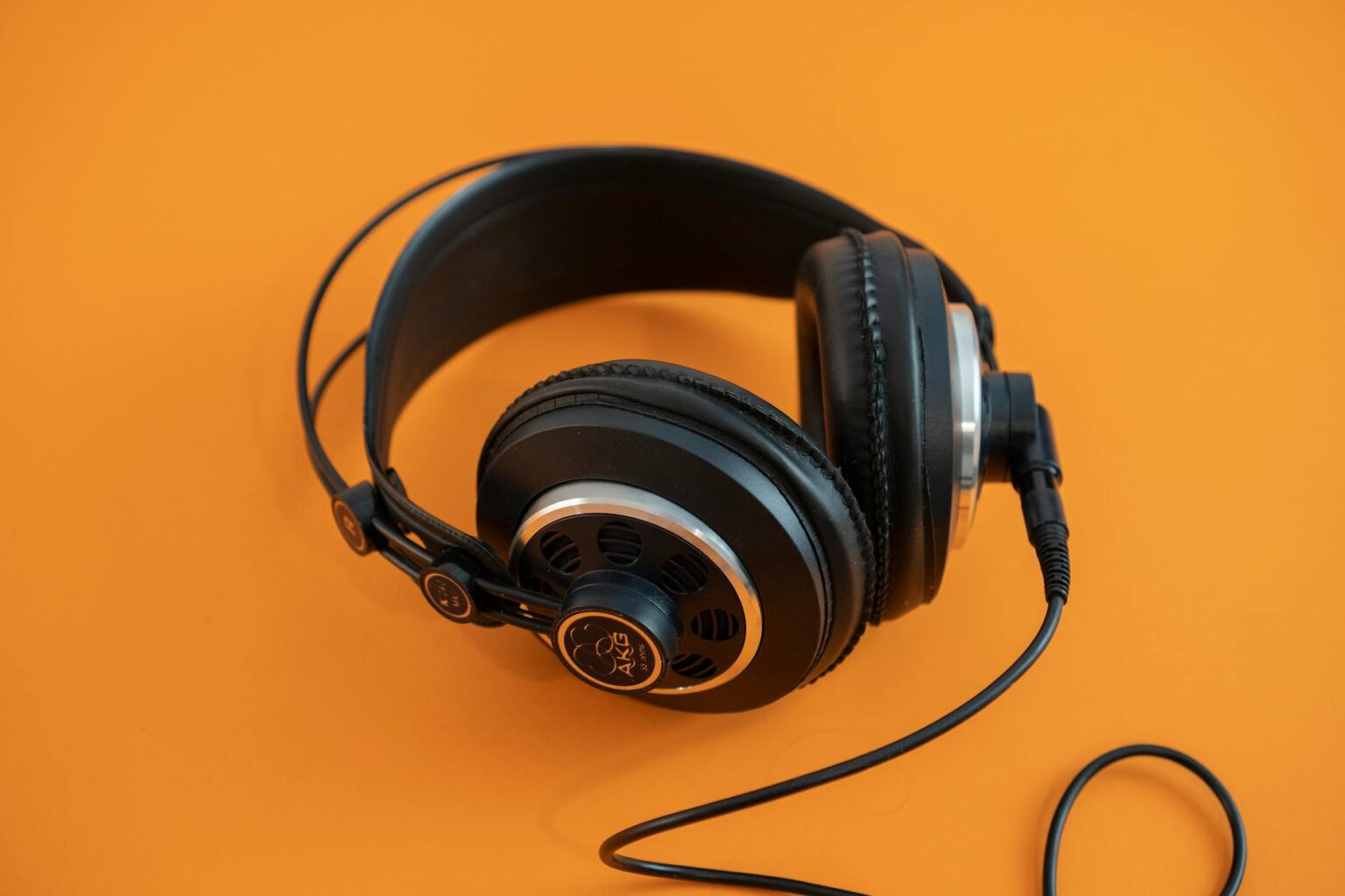 Professional studio headphones on audio mixing desk for high-quality music listening