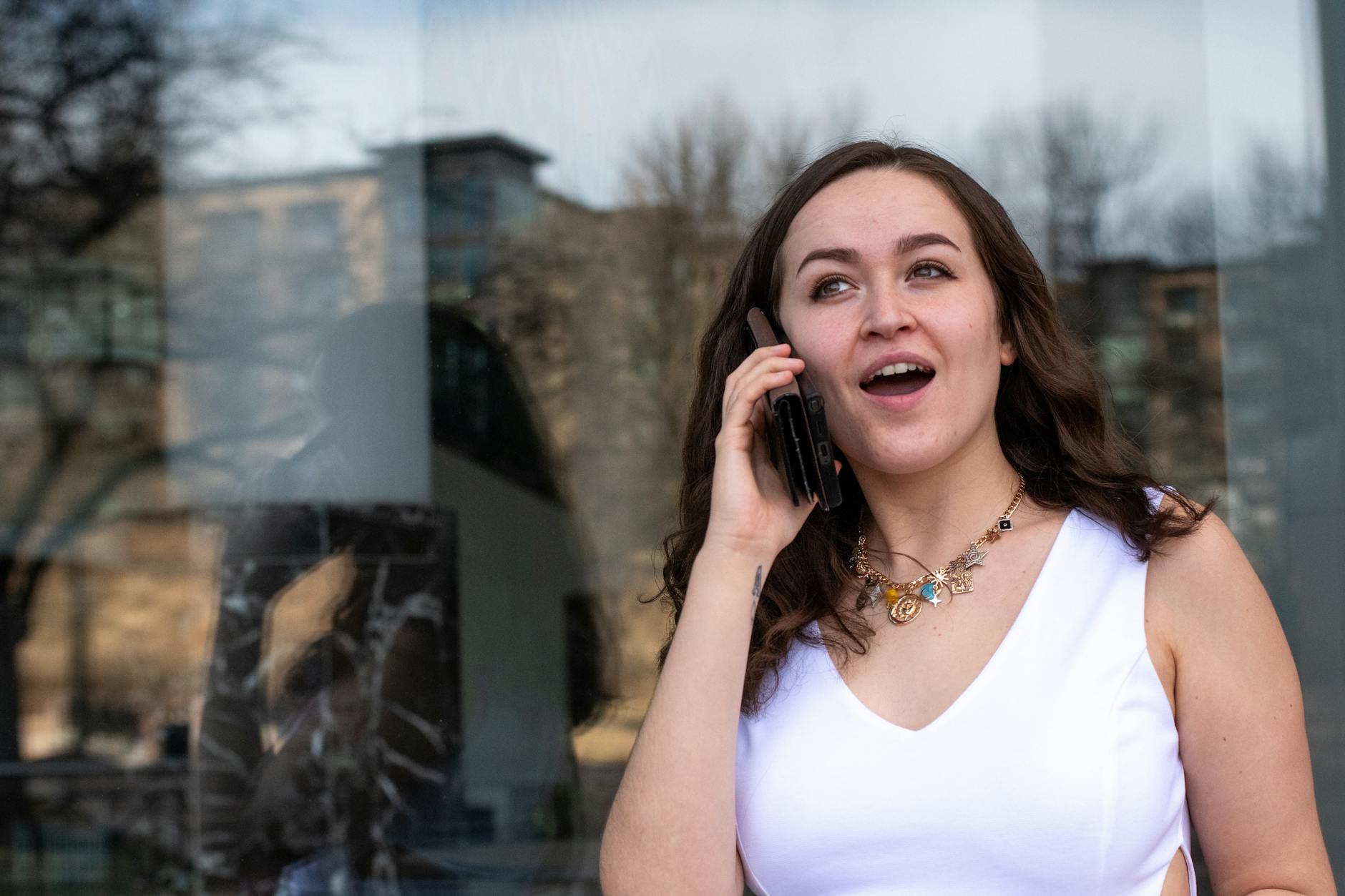 Urban intersection with traffic lights and monitoring systems demonstrating smart city technology