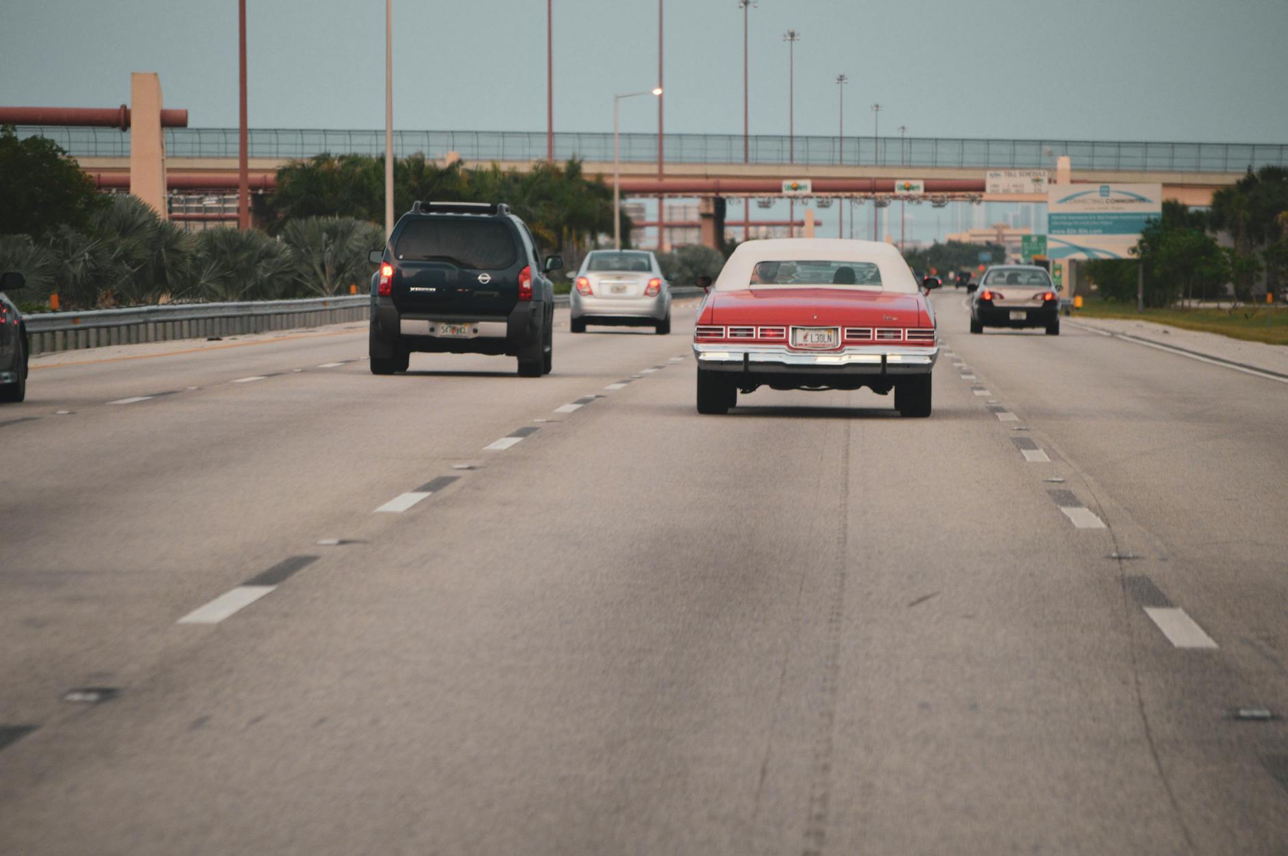 Cars driving on highway representing long-distance electric vehicle travel