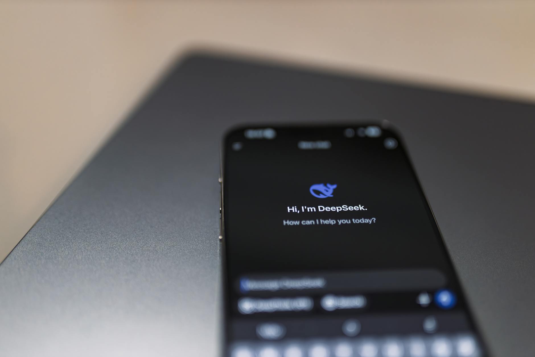 Smartphone displaying voice assistant interface with sound waves showing AI speech recognition in progress