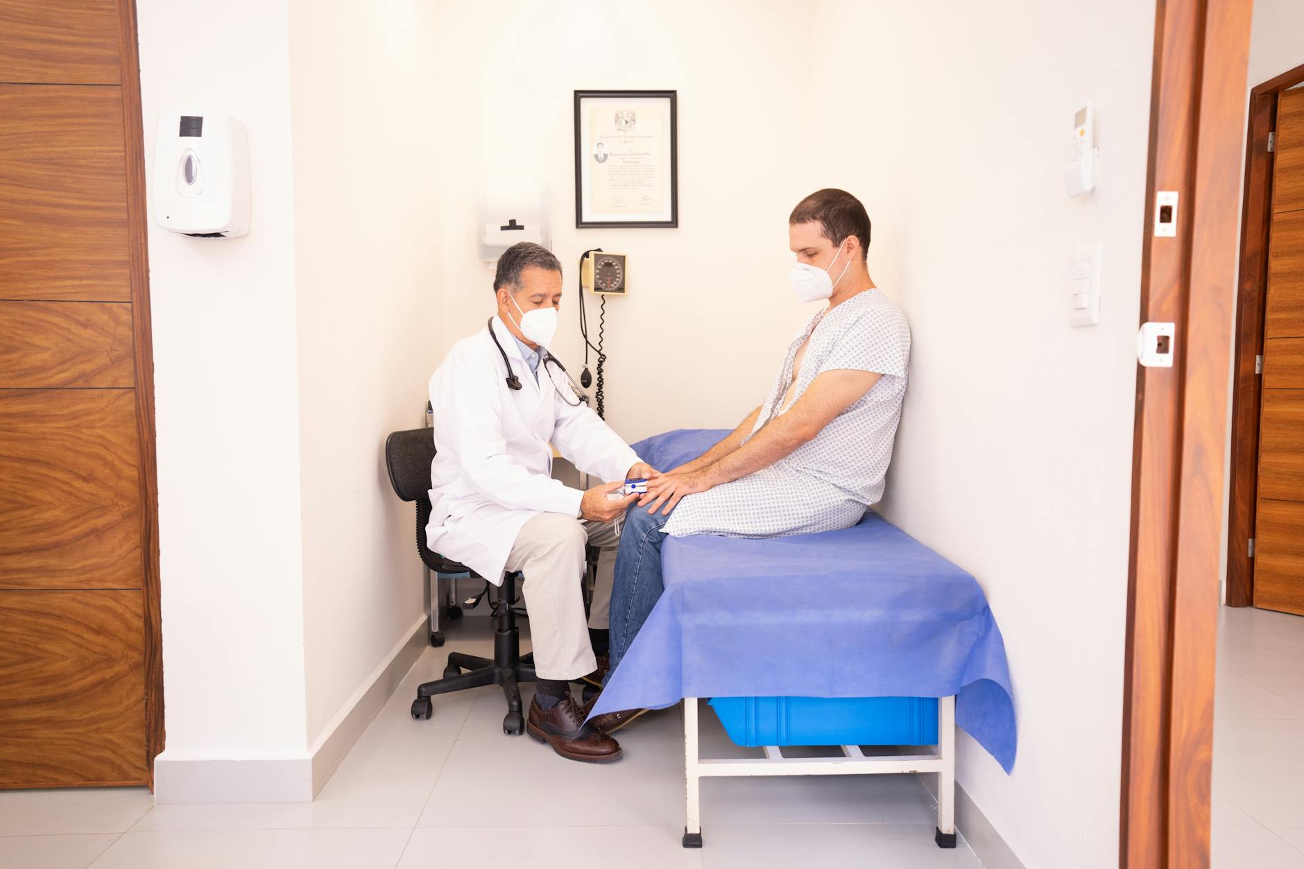 Healthcare provider consulting with patient in medical office setting