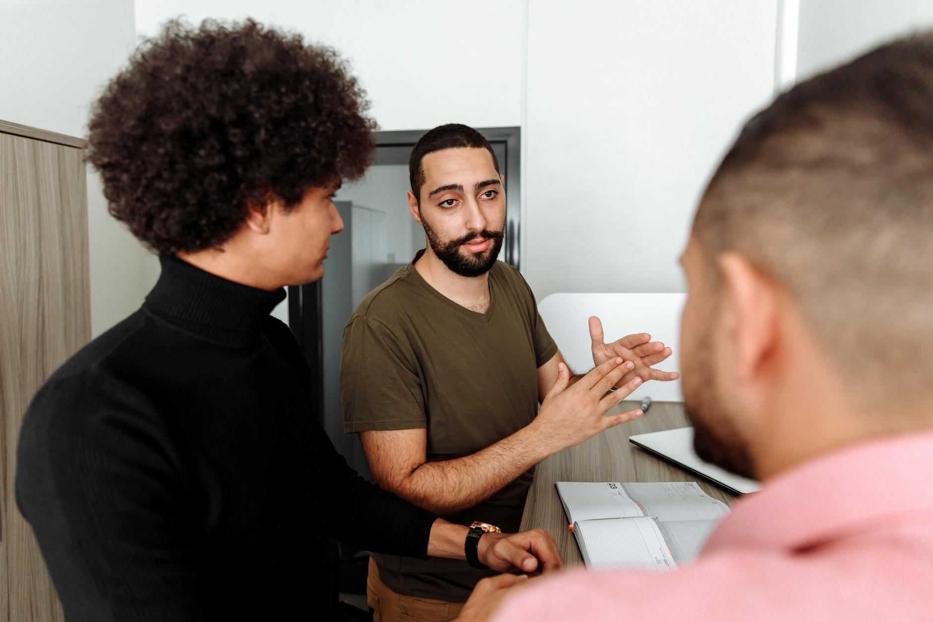 Group of diverse people having conversation illustrating different accents and dialects in human communication