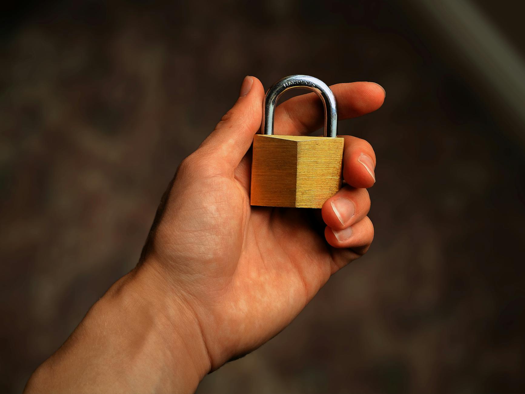 Digital security concept showing electronic locks and authentication symbols on dark background