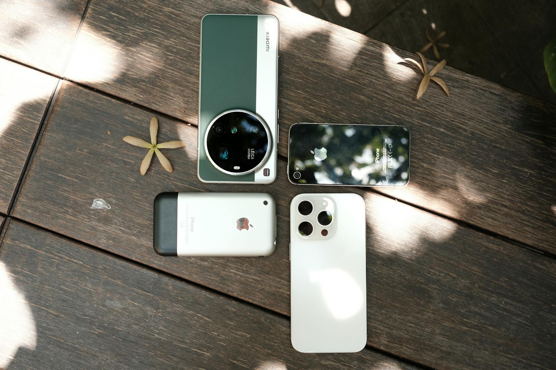 Two laptops side by side on desk showing comparison setup