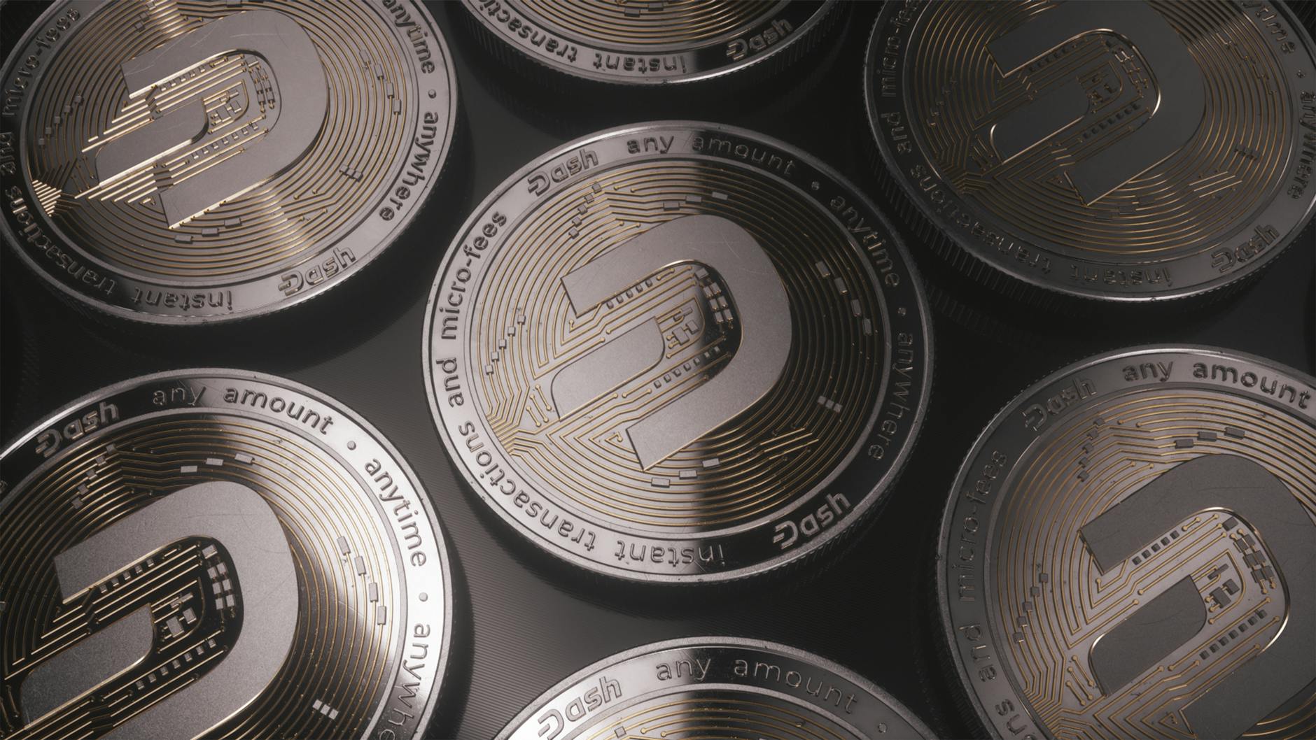 Collection of commemorative coins displayed on a dark surface