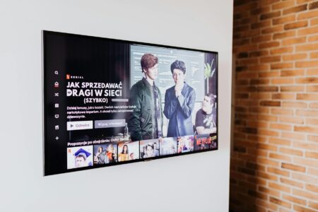 Peacock Enters Microdrama Market With Two Bravo Series Person watching streaming content on mobile device