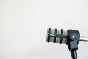 Professional podcast recording setup with microphone and headphones