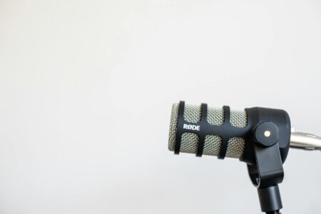 Professional podcast recording setup with microphone and headphones