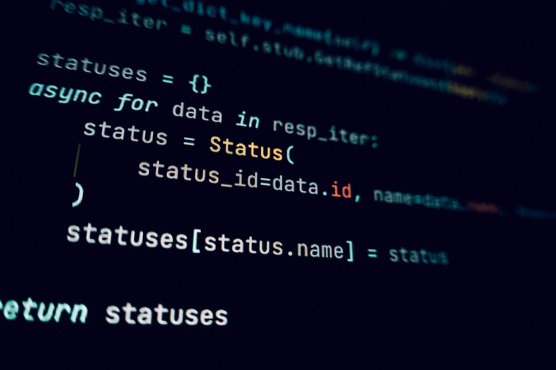 Developer working on secure code implementation at computer workstation