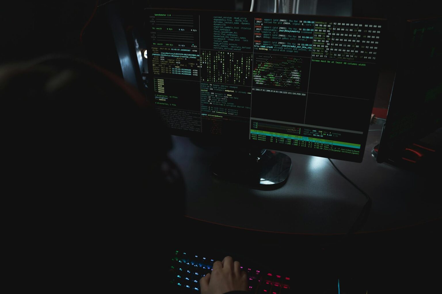Close-up view of computer code on screen showing security-related programming