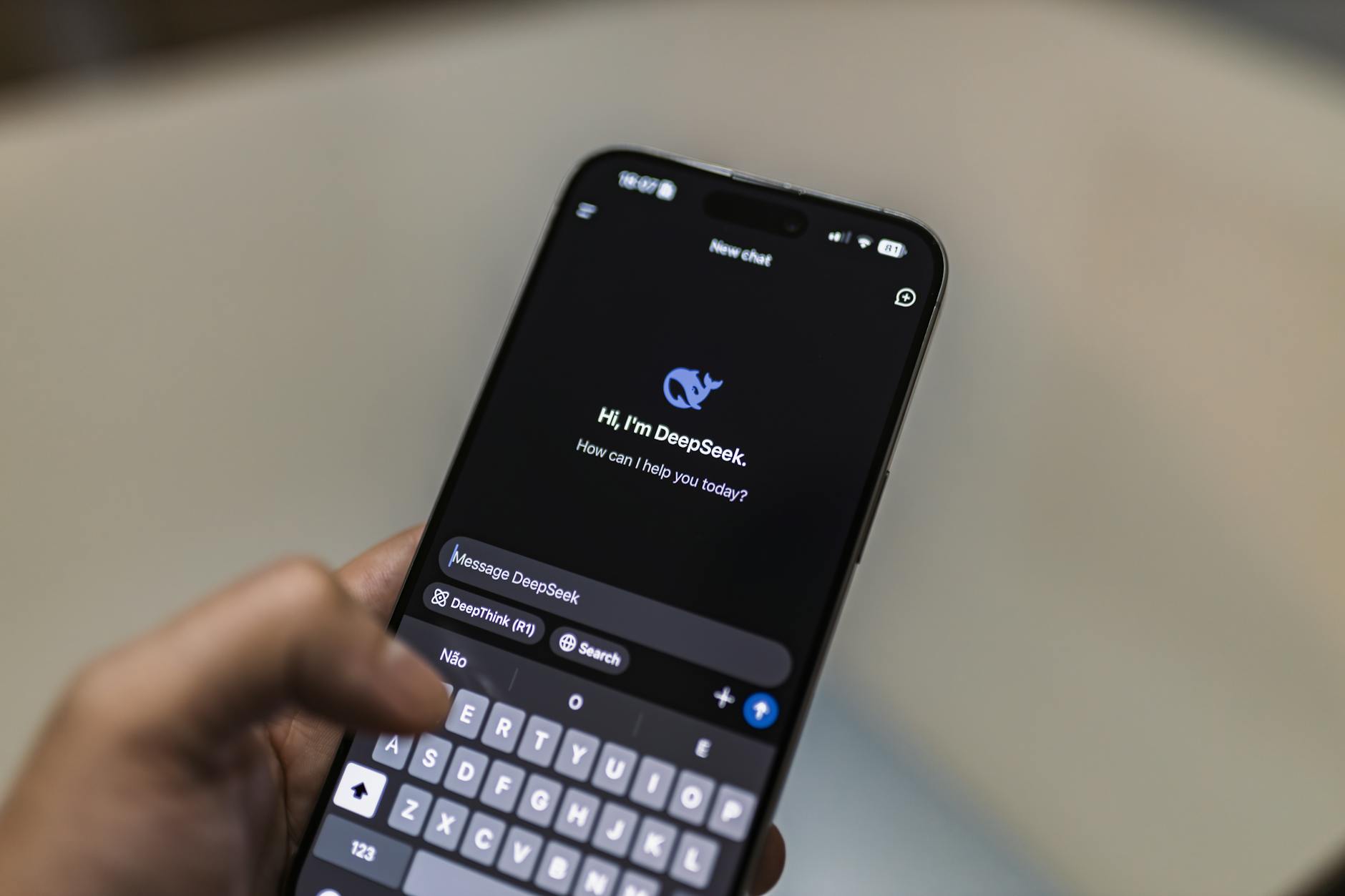 Person using smartphone with AI chatbot interface on screen