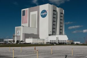 A large rocket standing on a launch pad before liftoff