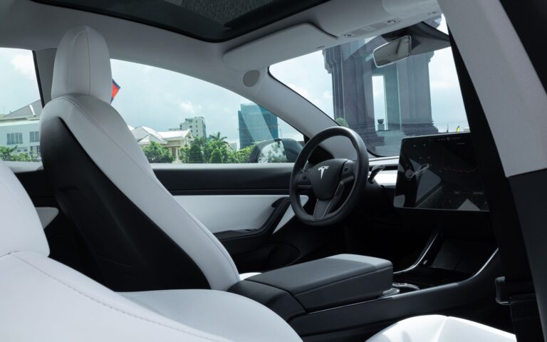 Ferrari Luce: Jony Ives LoveFrom Shapes the Prancing Horses First EV Sleek luxury electric vehicle exterior at a reveal event
