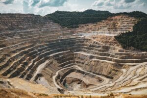How a new extraction process could unlock the world’s lithium Open pit lithium mining operation with exposed rock and machinery