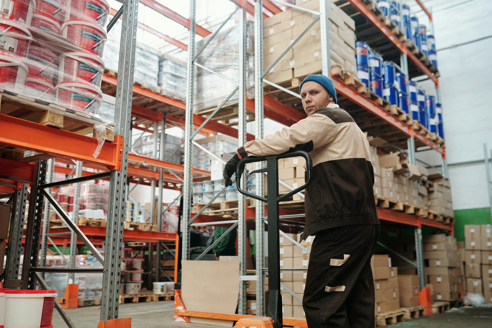 Workers organizing packages in fulfillment center