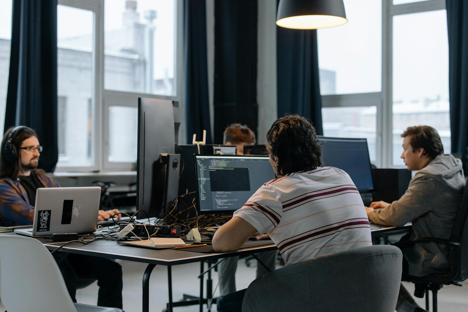 Software developers collaborating on code review and security analysis