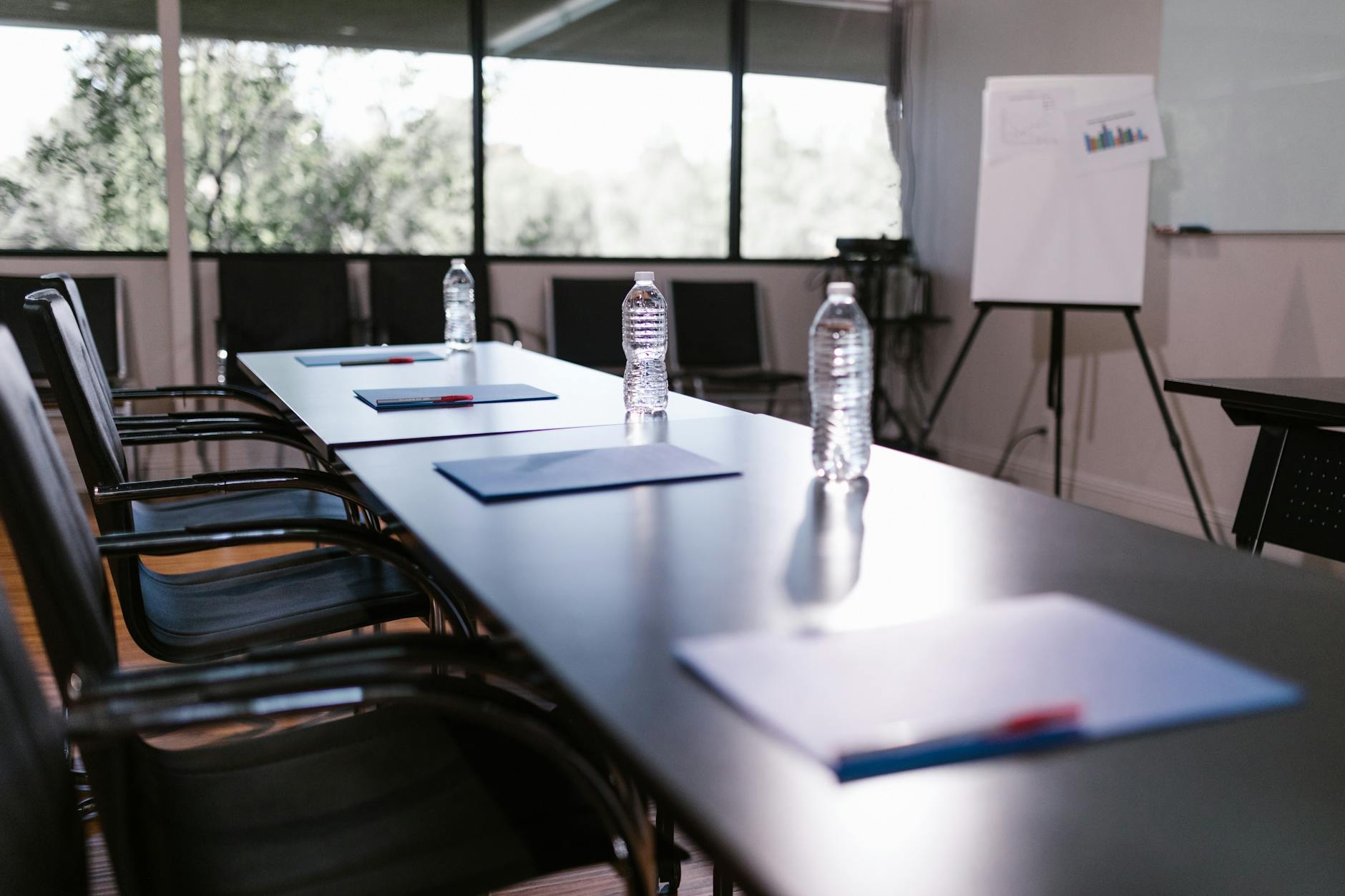 Business professionals in conference room during restructuring discussion