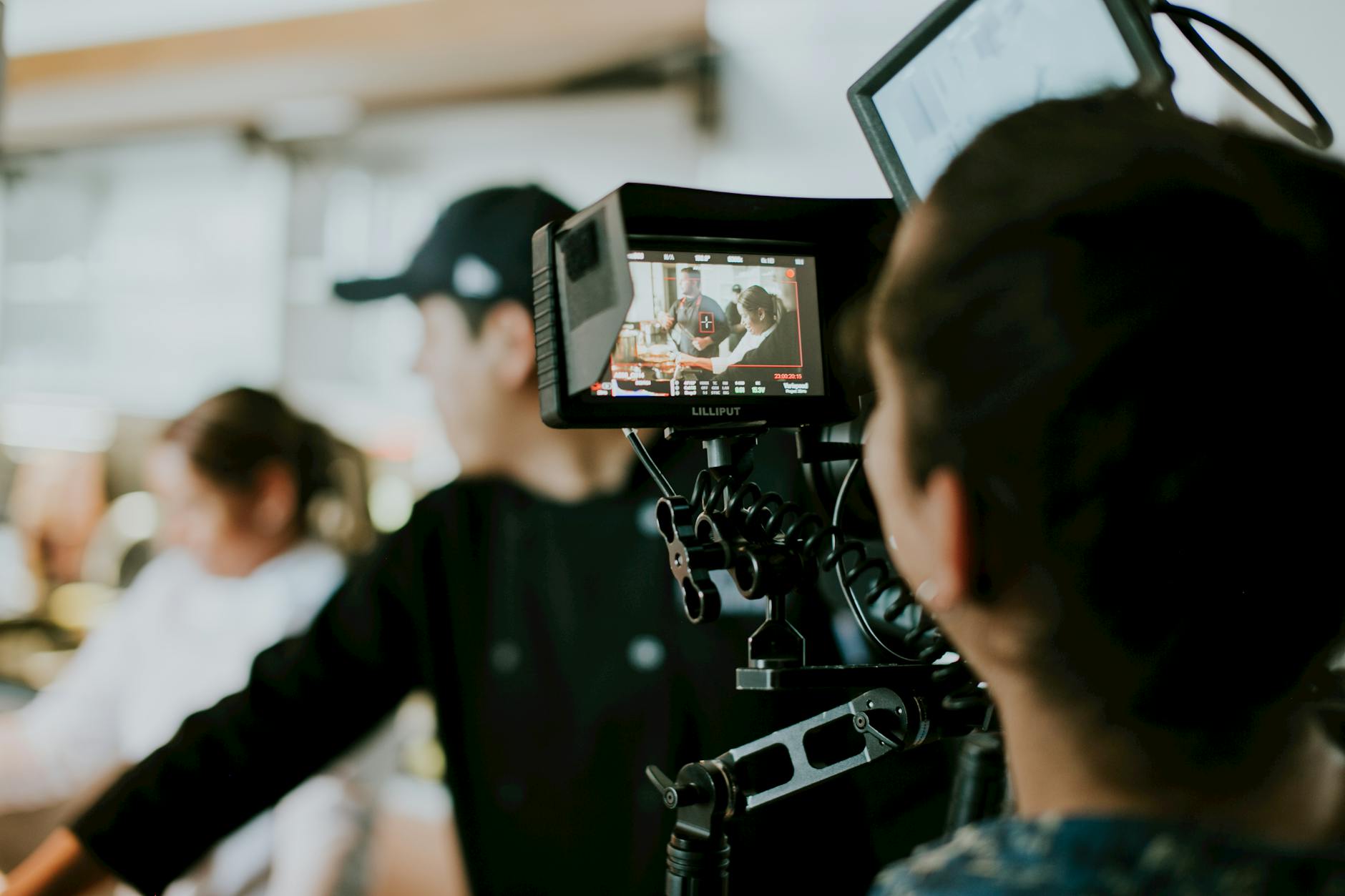 Traditional film production crew with cameras and equipment