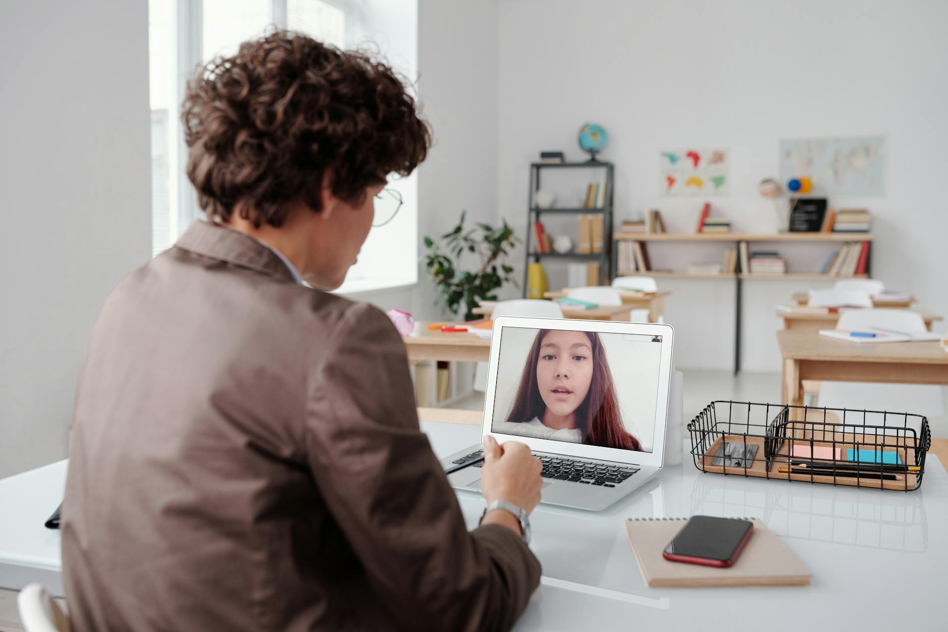 Person taking an online course on laptop computer