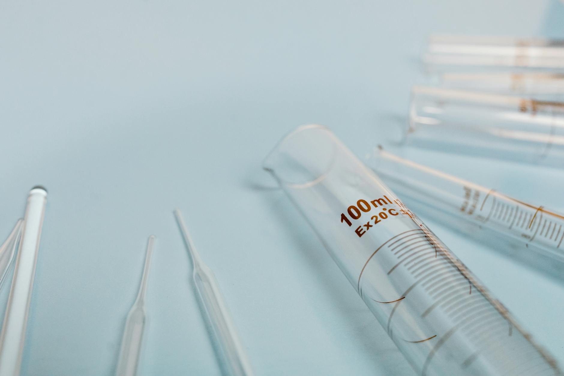 Researcher working with chemical solutions in a laboratory setting