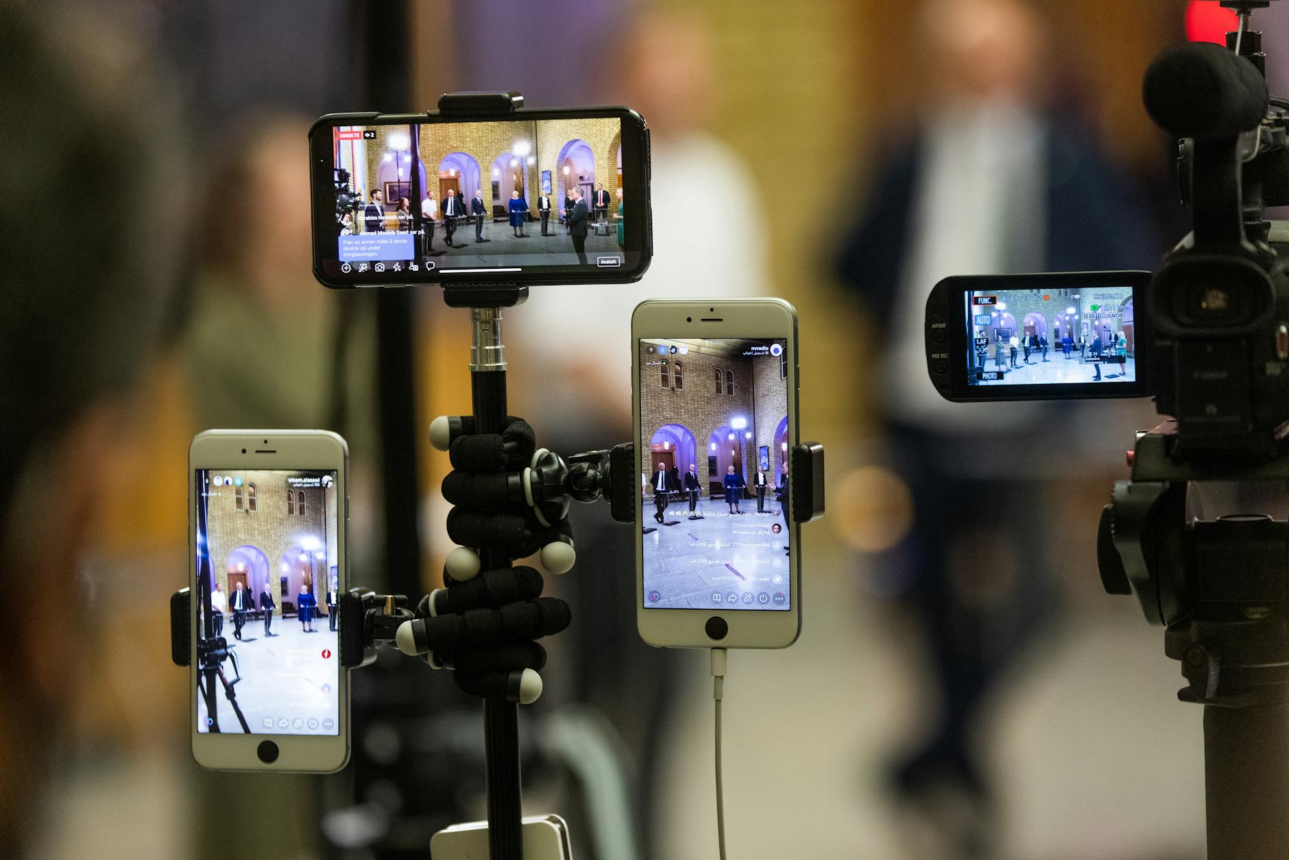 Various streaming media devices arranged on wooden surface