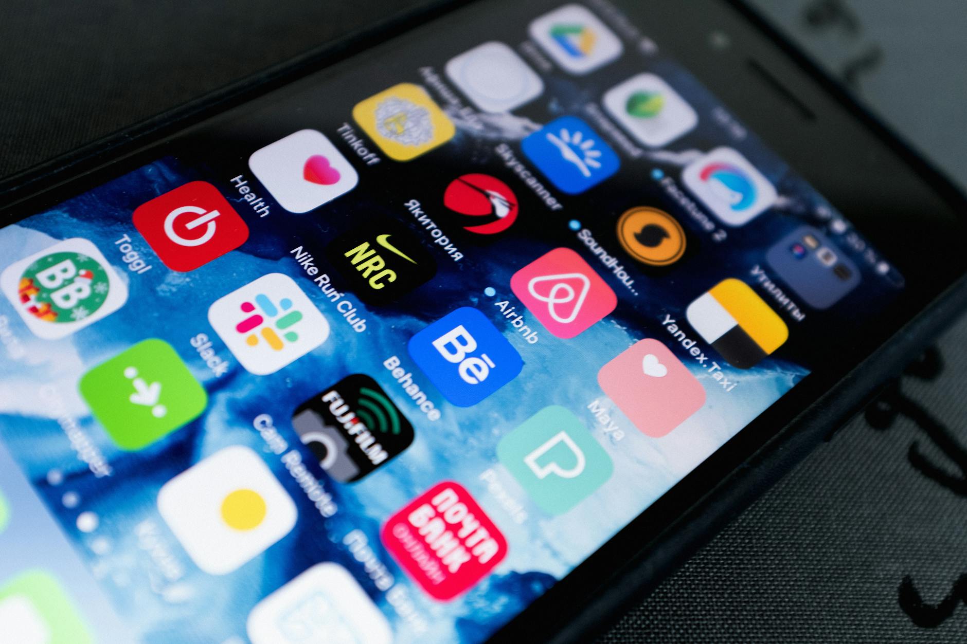 Multiple mobile apps displayed on smartphone screen