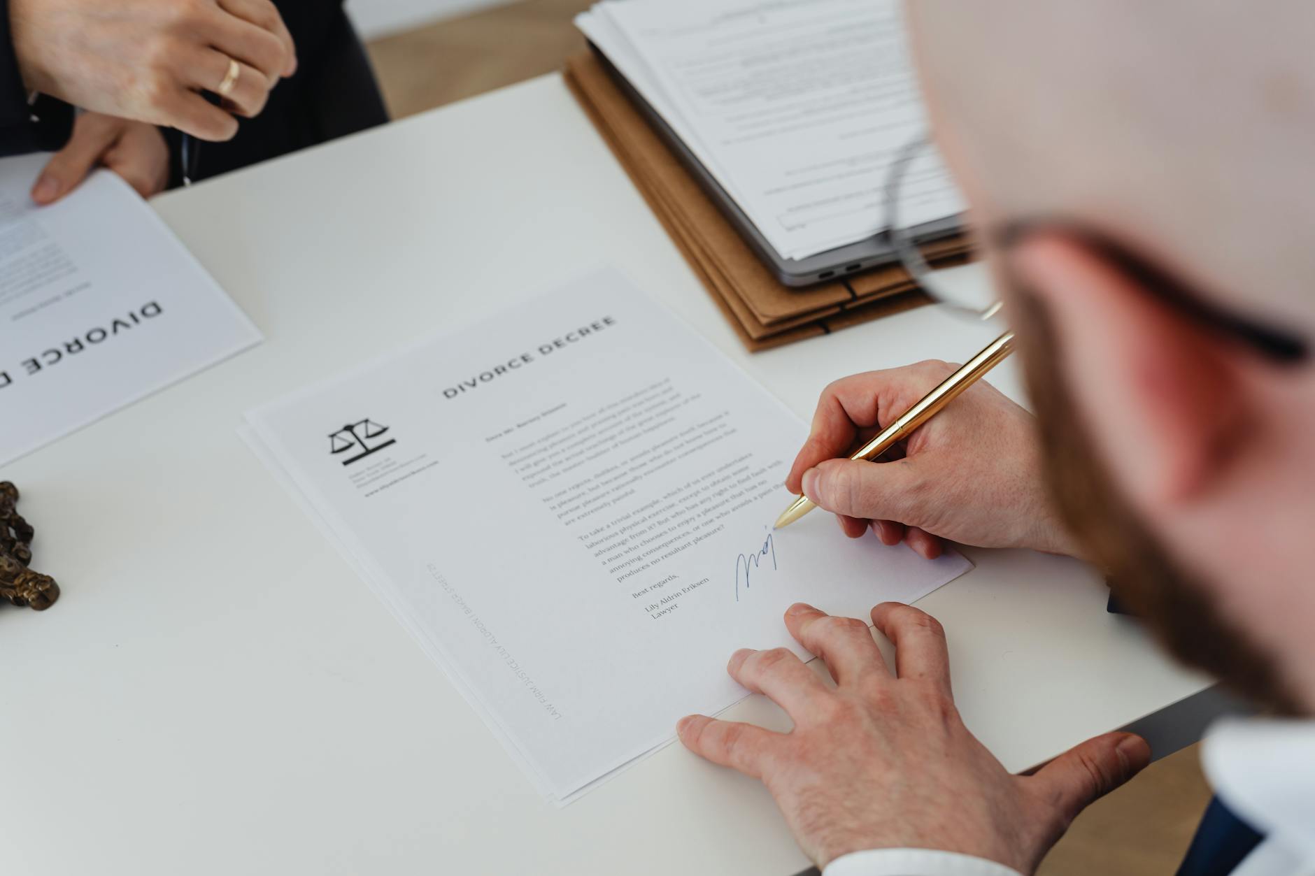 Stack of official regulatory filing papers on professional desk