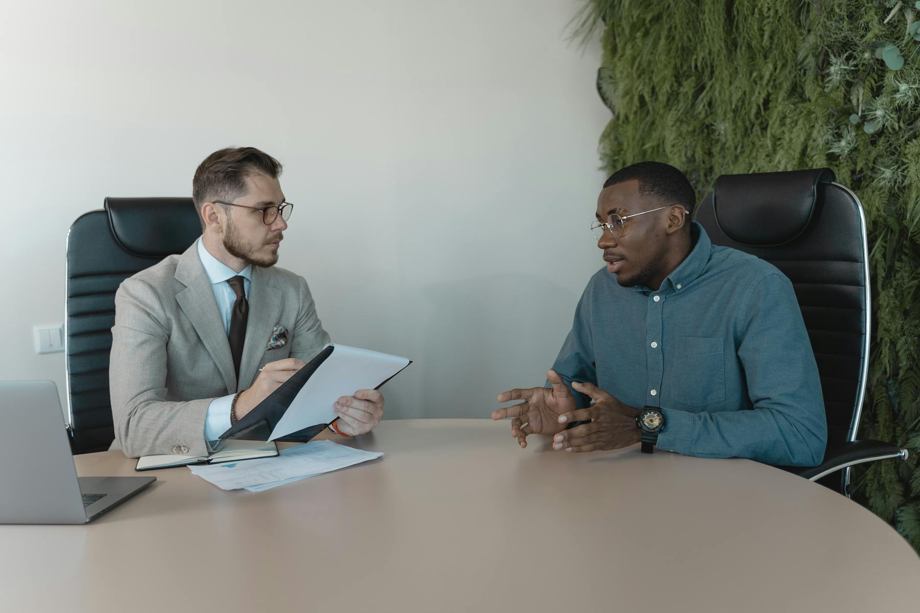 Job candidate meeting with hiring manager during talent acquisition process
