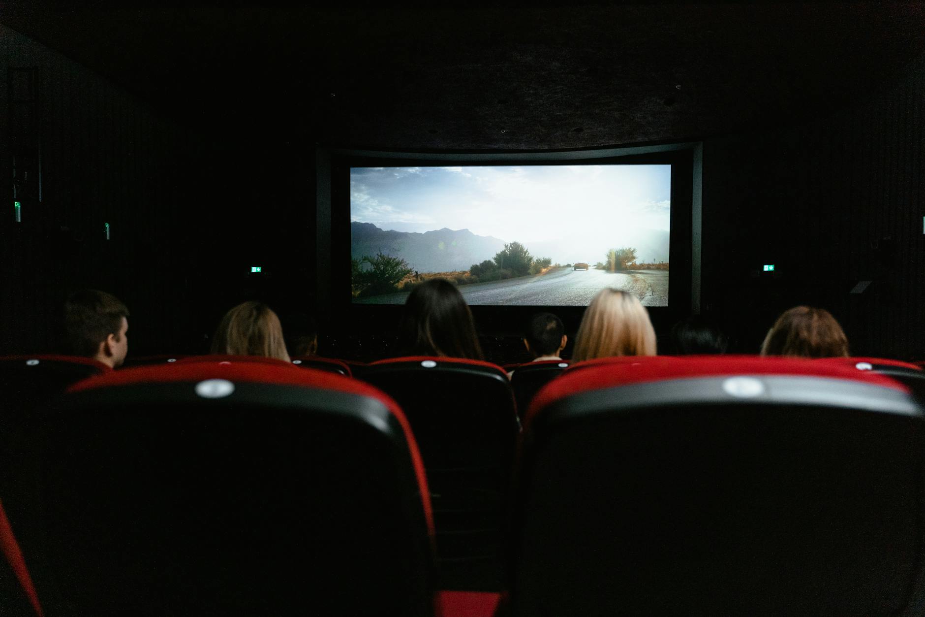 Cinema screen display representing entertainment media crossover opportunities