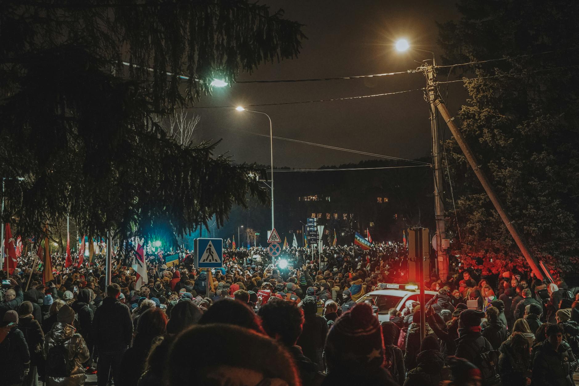 People gathered in a public square representing democratic participation and civic engagement