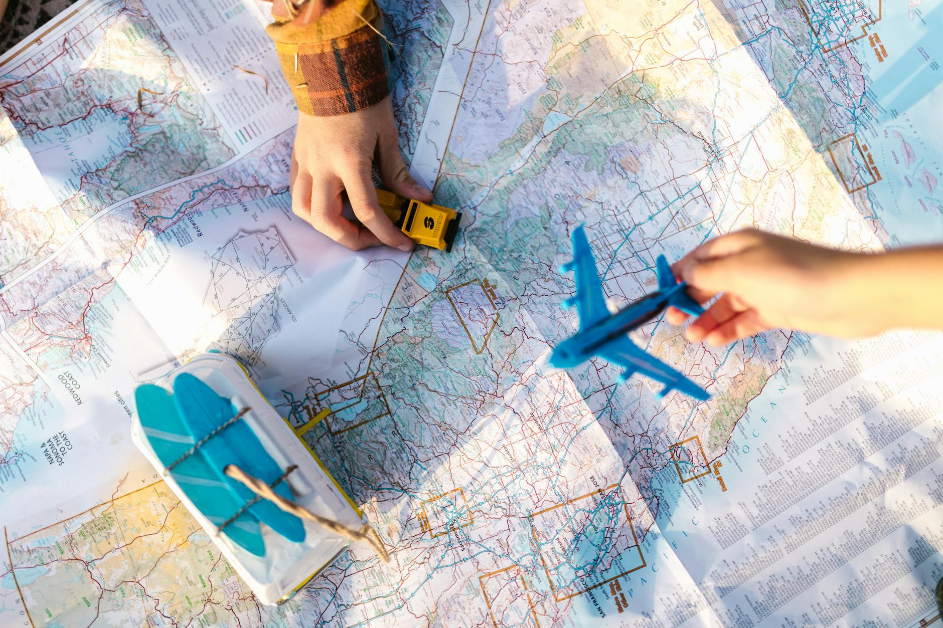 Travel planning materials with maps and booking confirmations