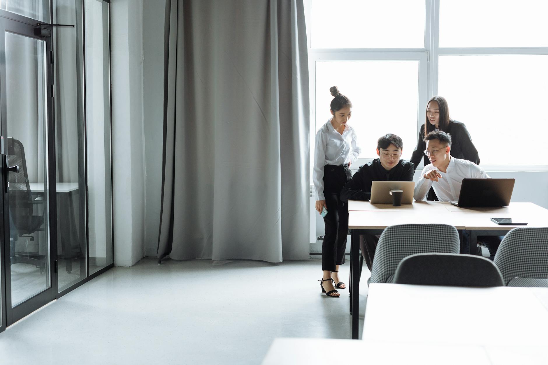 Modern office environment with enterprise technology tools on a desk