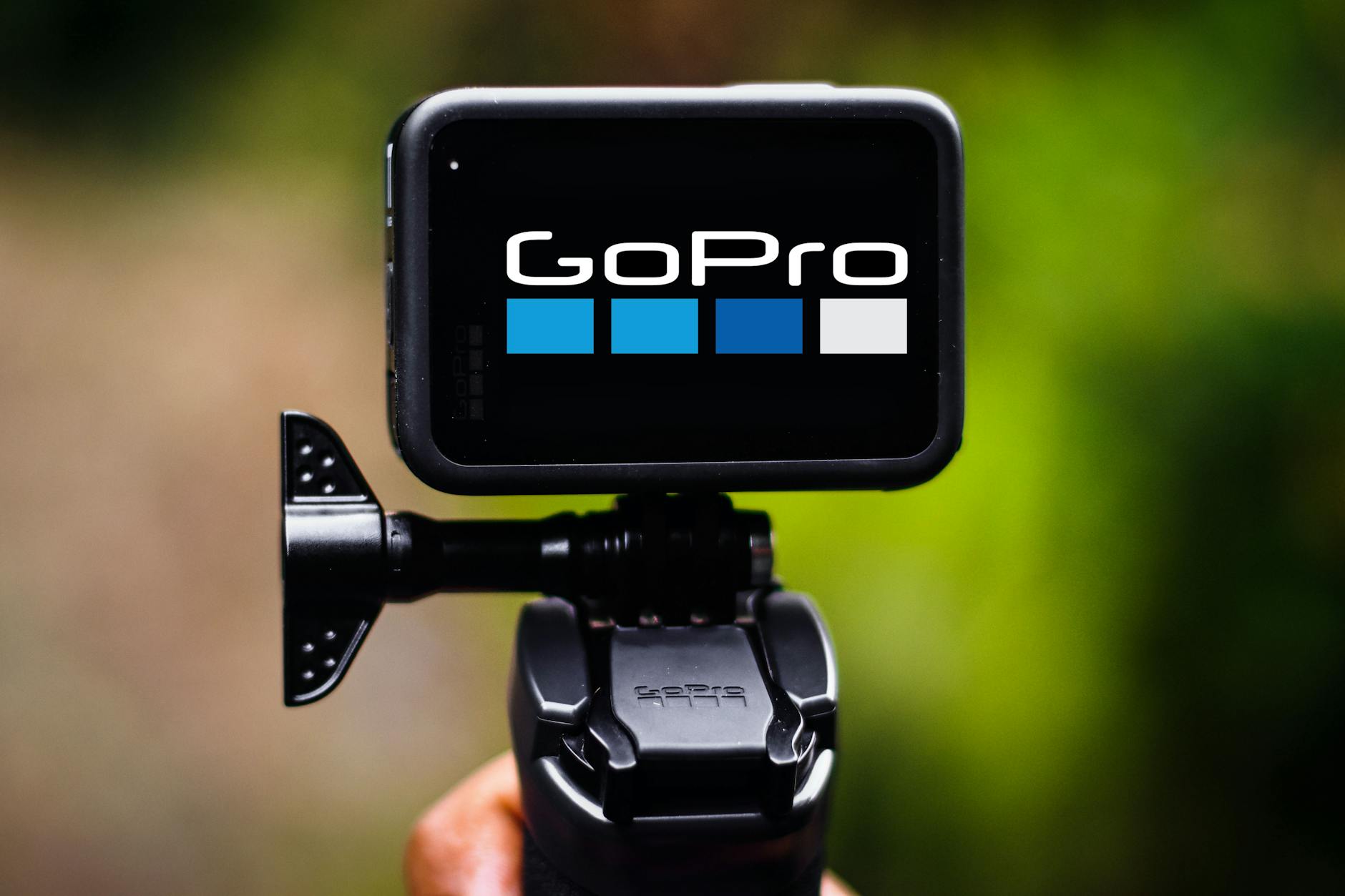 GoPro-style action camera mounted outdoors during an adventure activity