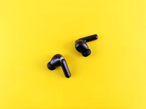 AirPods and Pacemakers: The Magnet Problem Cardiologists Flag A pair of white wireless earbuds resting on a surface near their charging case