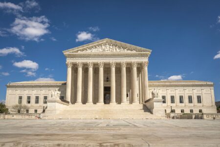 DOJ Backs xAI in NAACP Data Center Pollution Lawsuit Federal courthouse exterior representing DOJ legal intervention in xAI NAACP lawsuit