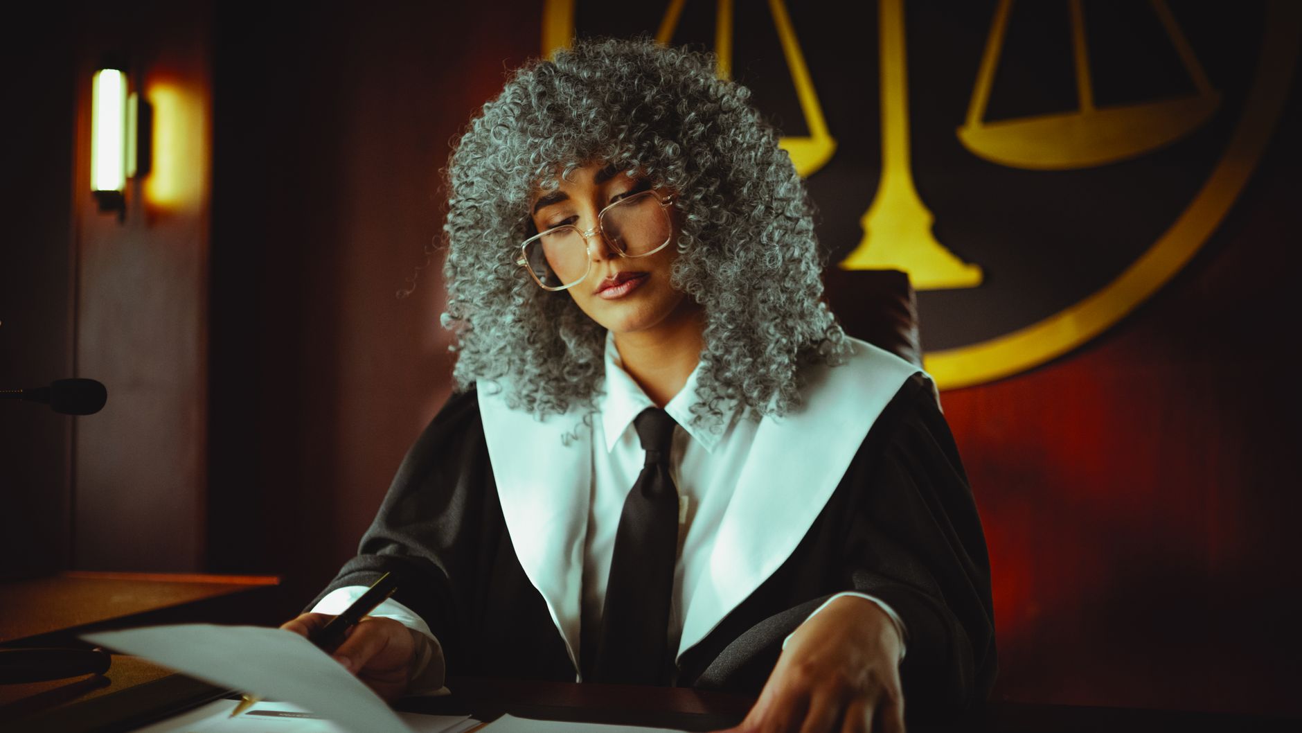 Legal documents and courtroom setting representing lawsuit proceedings