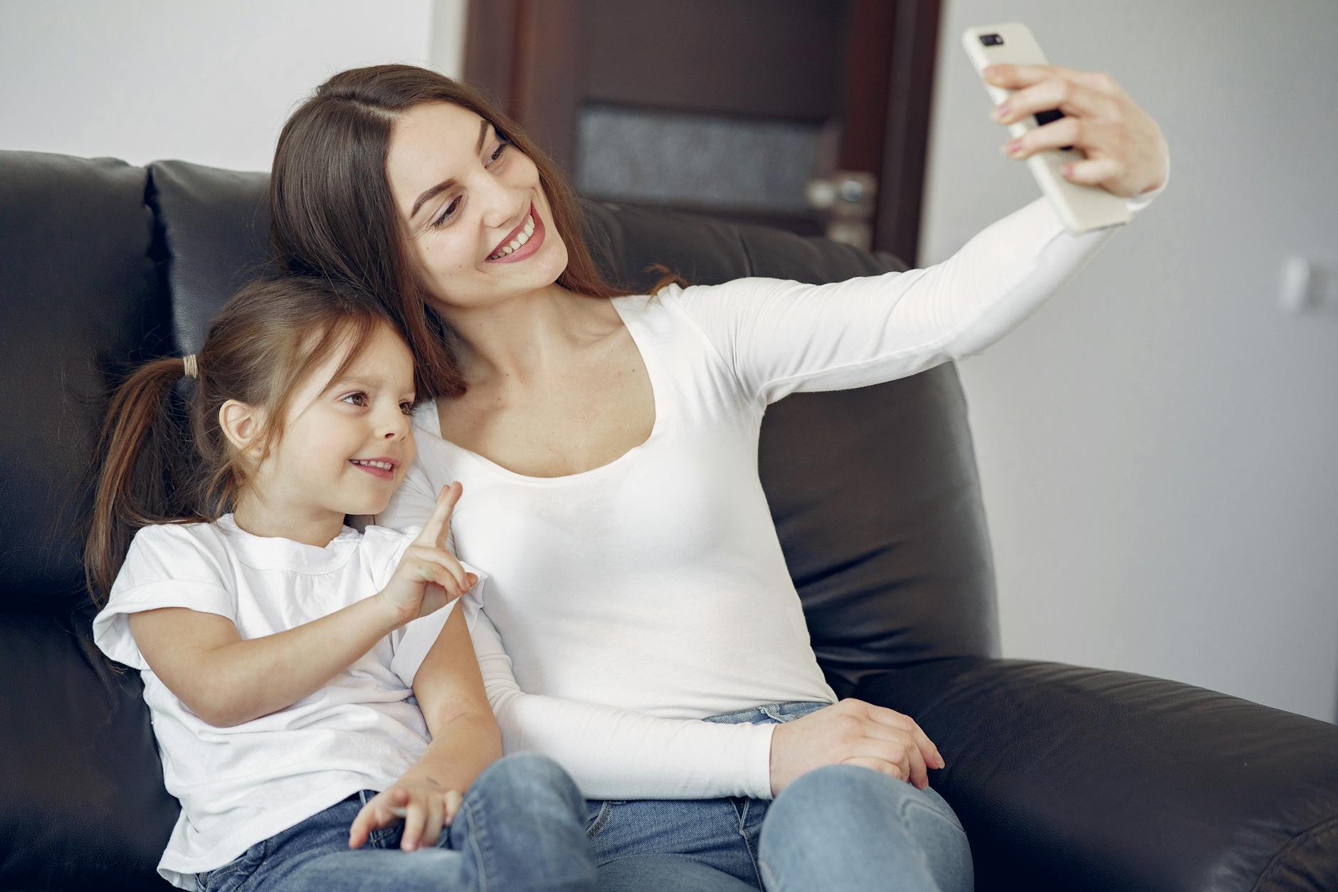 Young person using a tablet or phone, illustrating concerns about social media and children