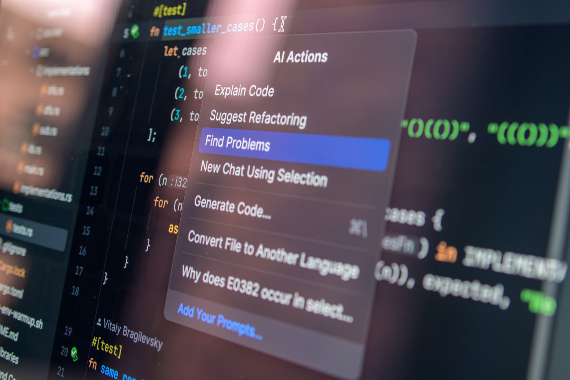 A developer using AI tools to write code on a laptop illustrating vibe coding practices