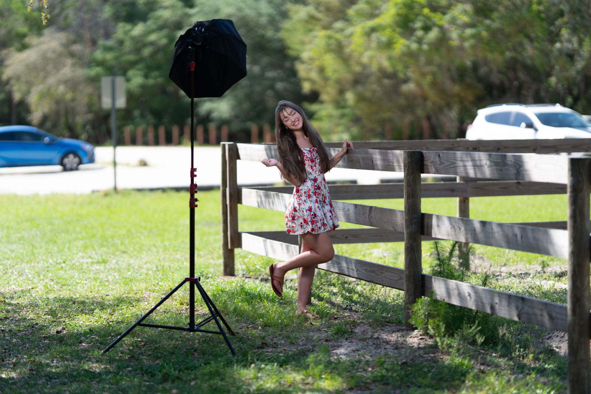 Videographer filming in challenging natural light conditions at golden hour