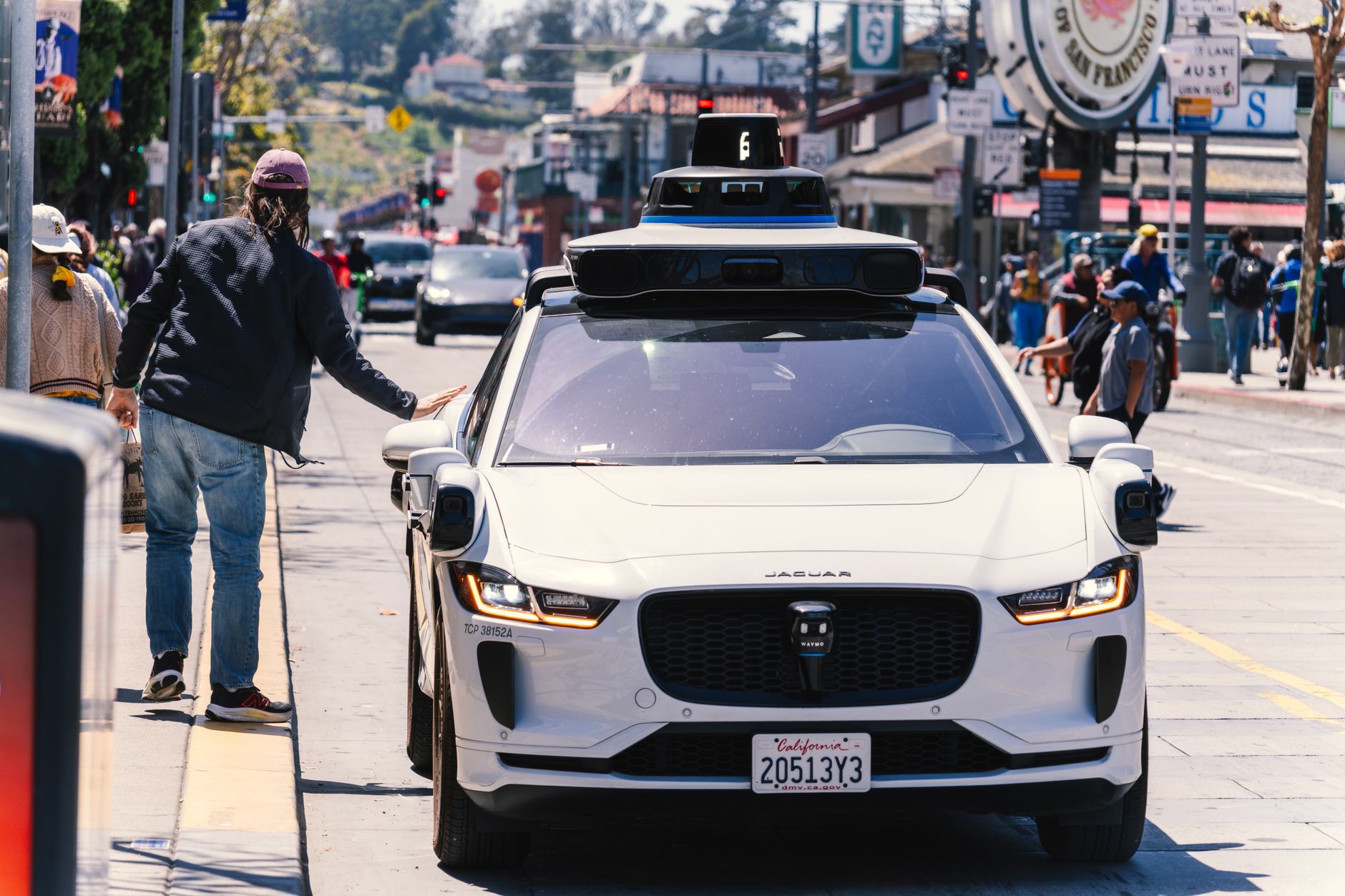 A self-driving autonomous vehicle on a city street