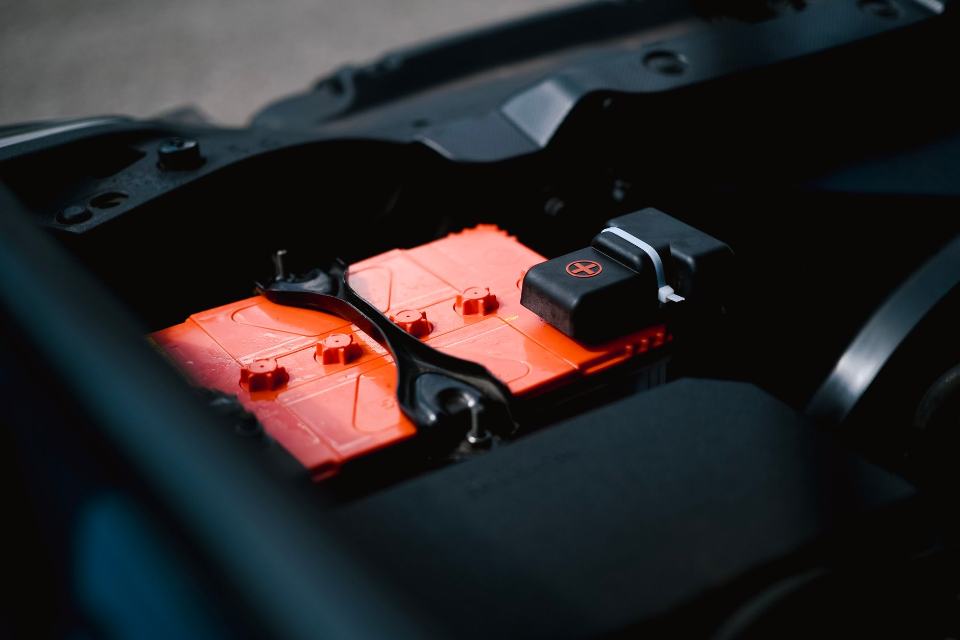 Researcher working on battery cells in a laboratory setting