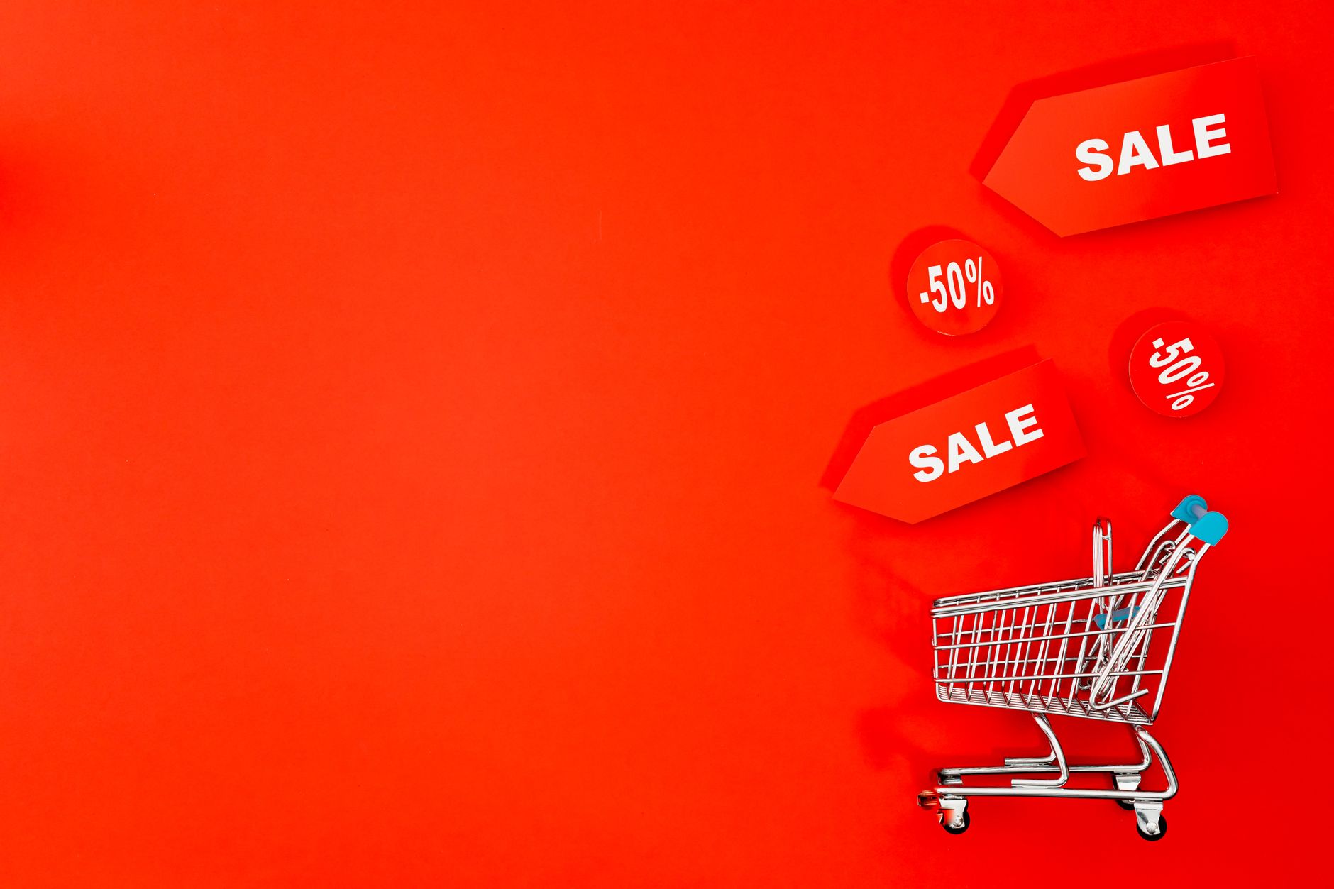 Person browsing online store on laptop looking for discount codes