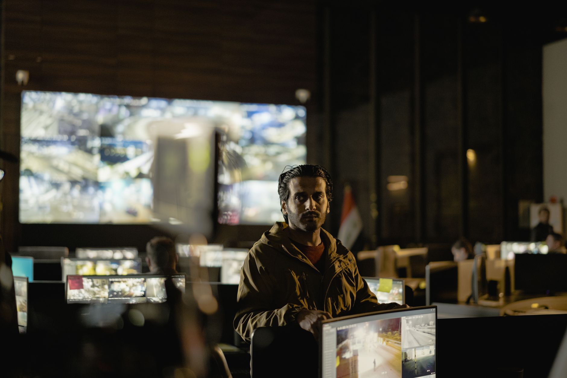 Computer monitor displaying code surveillance interface representing AI tracking and security concerns