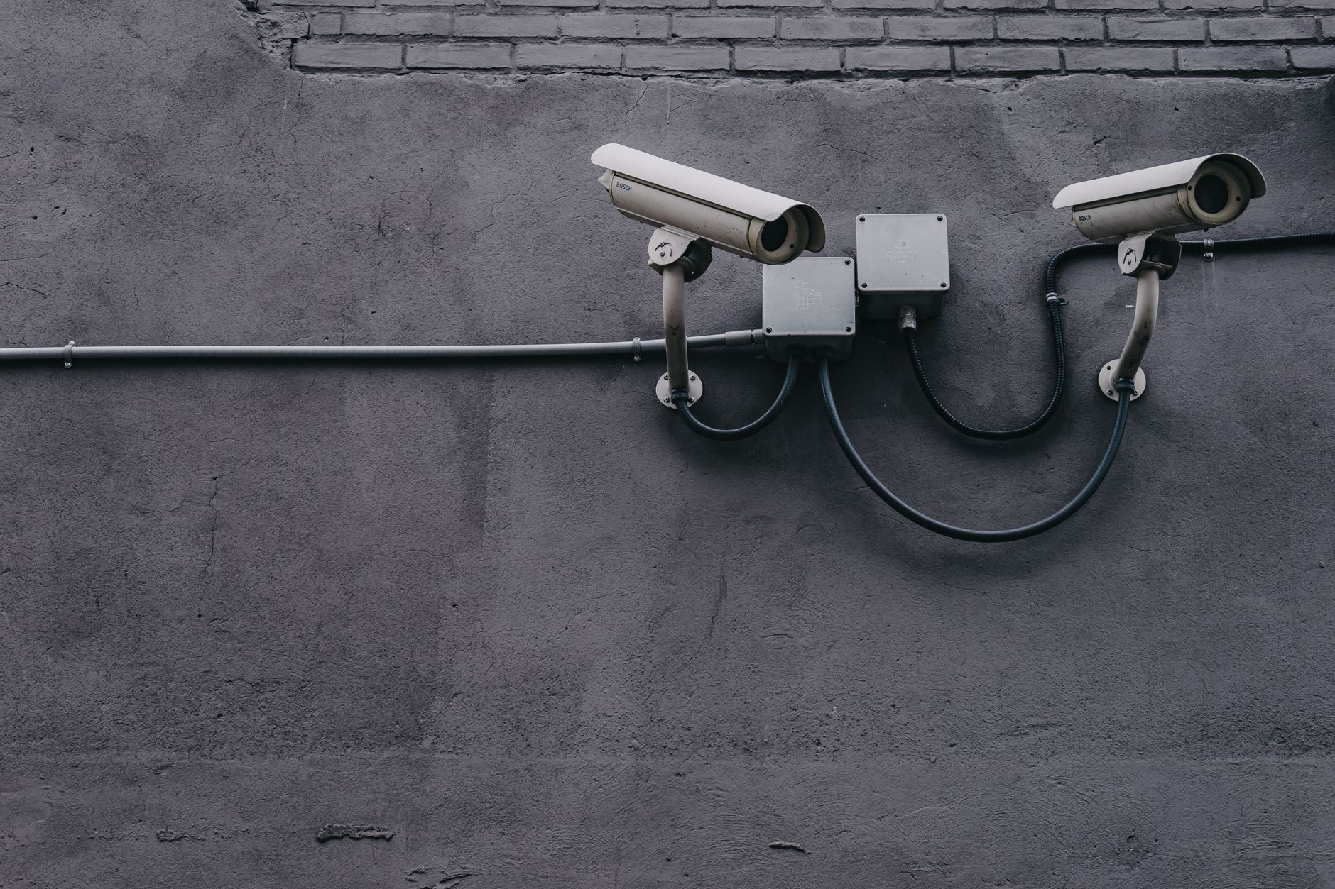 Person using smartphone with digital privacy and surveillance concept overlay