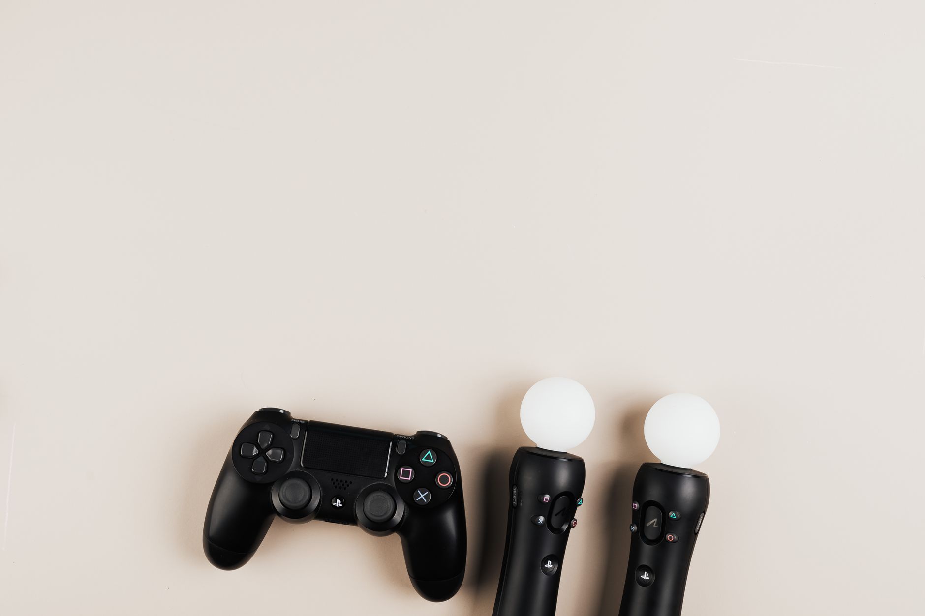 PlayStation 5 console and controller on a gaming desk
