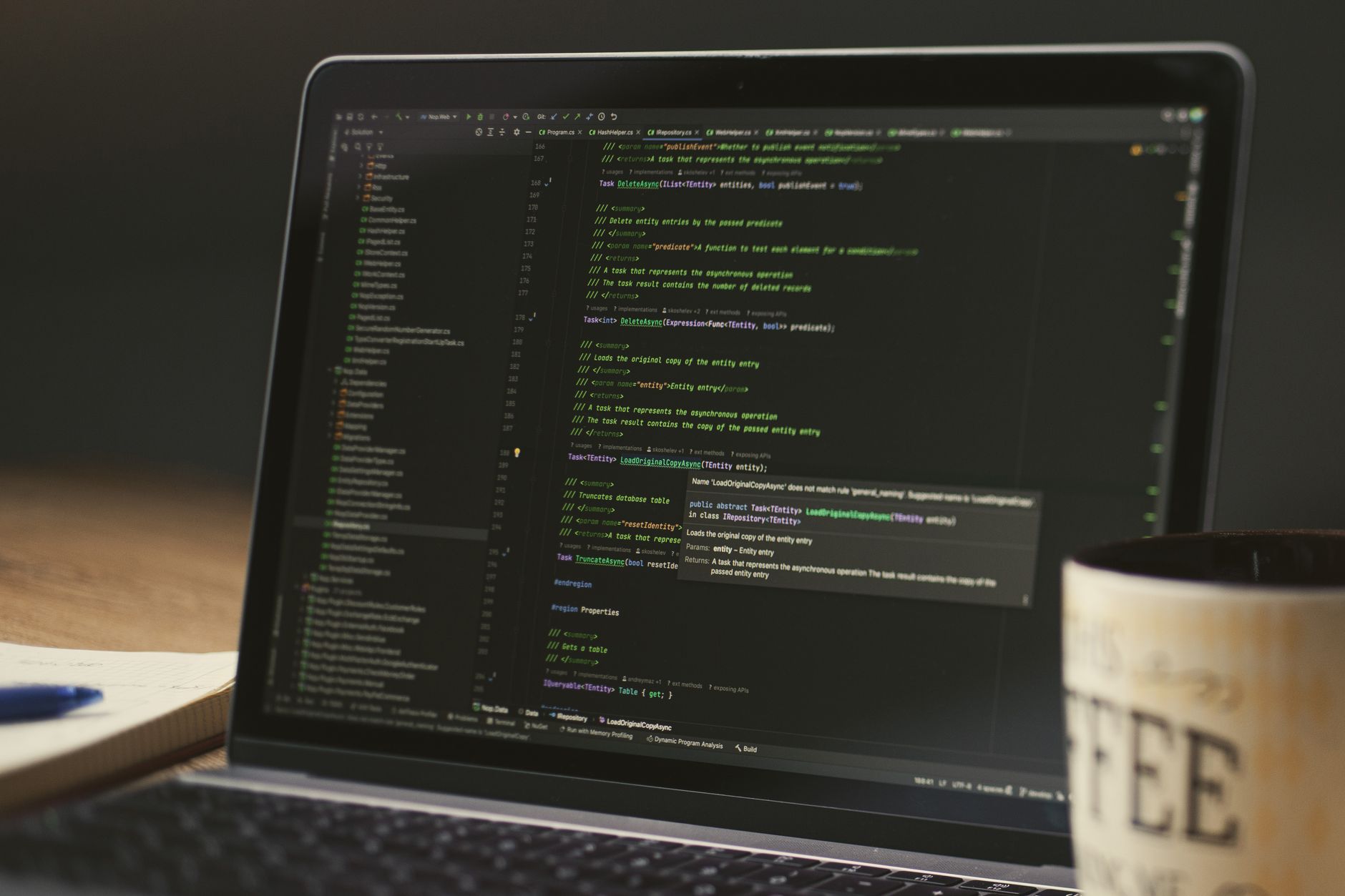 Developer working on a laptop configuring an AI agent pipeline
