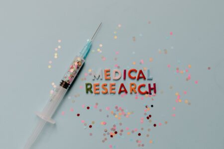 A $38.5 Million Bet on Unlocking Gene Expression in Children Researcher reviewing pediatric medical data in a laboratory setting