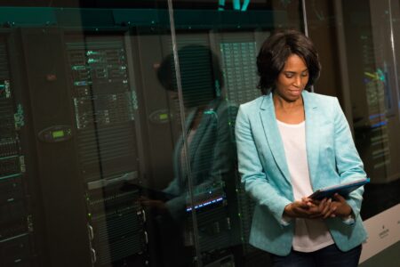 Dimly lit server room representing AI infrastructure security monitoring