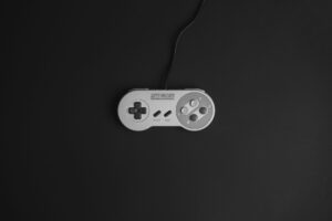A Nintendo Switch controller resting on a gaming desk in 2026